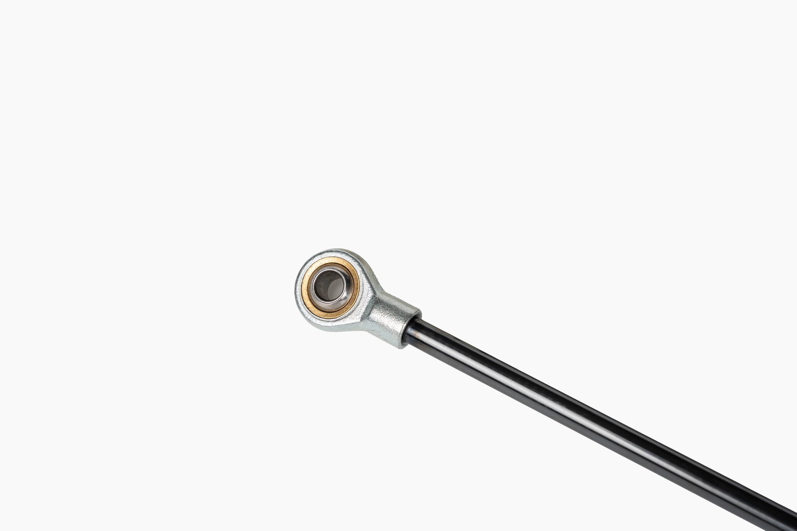 Close-up of compression gas spring piston rod guide seal and fitting