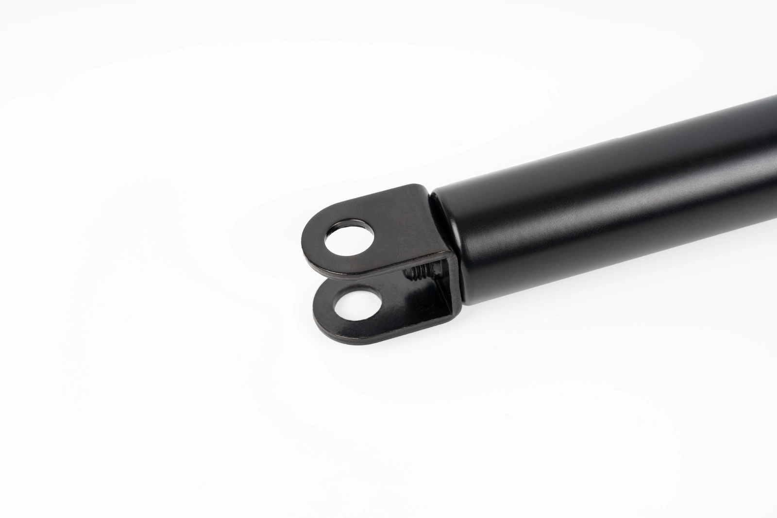 Adjustable locking gas spring showing cylinder body and mounting end fitting