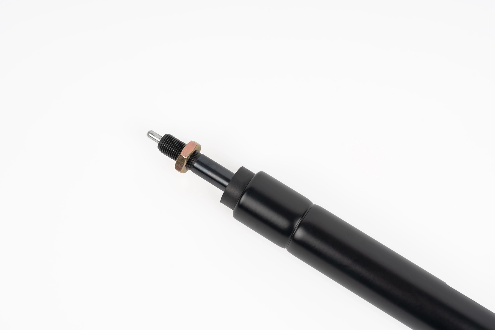 Angled view of remote release gas spring rod end and release mechanism